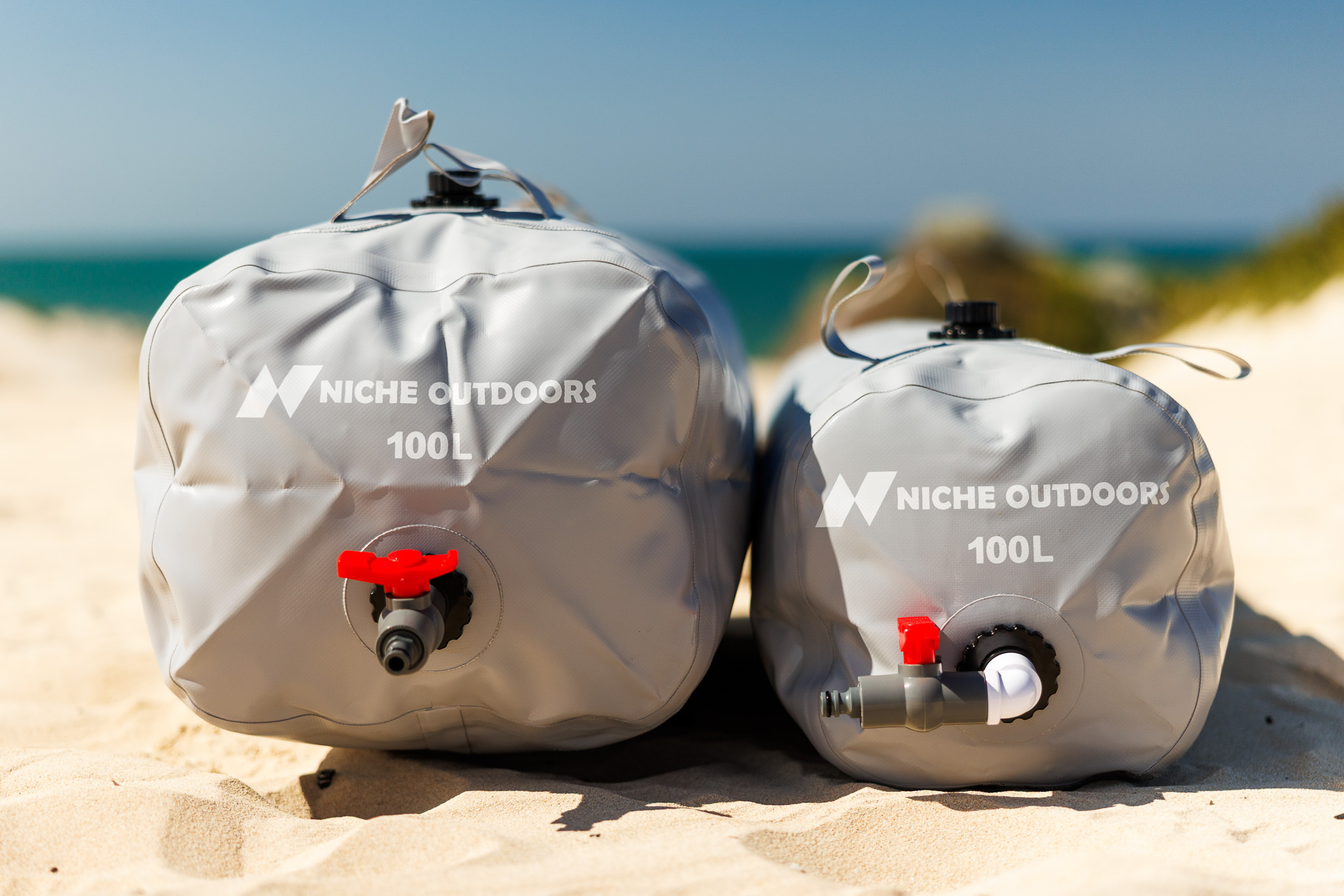 Niche Outdoors 100L Slim and Wide water bladders side by side